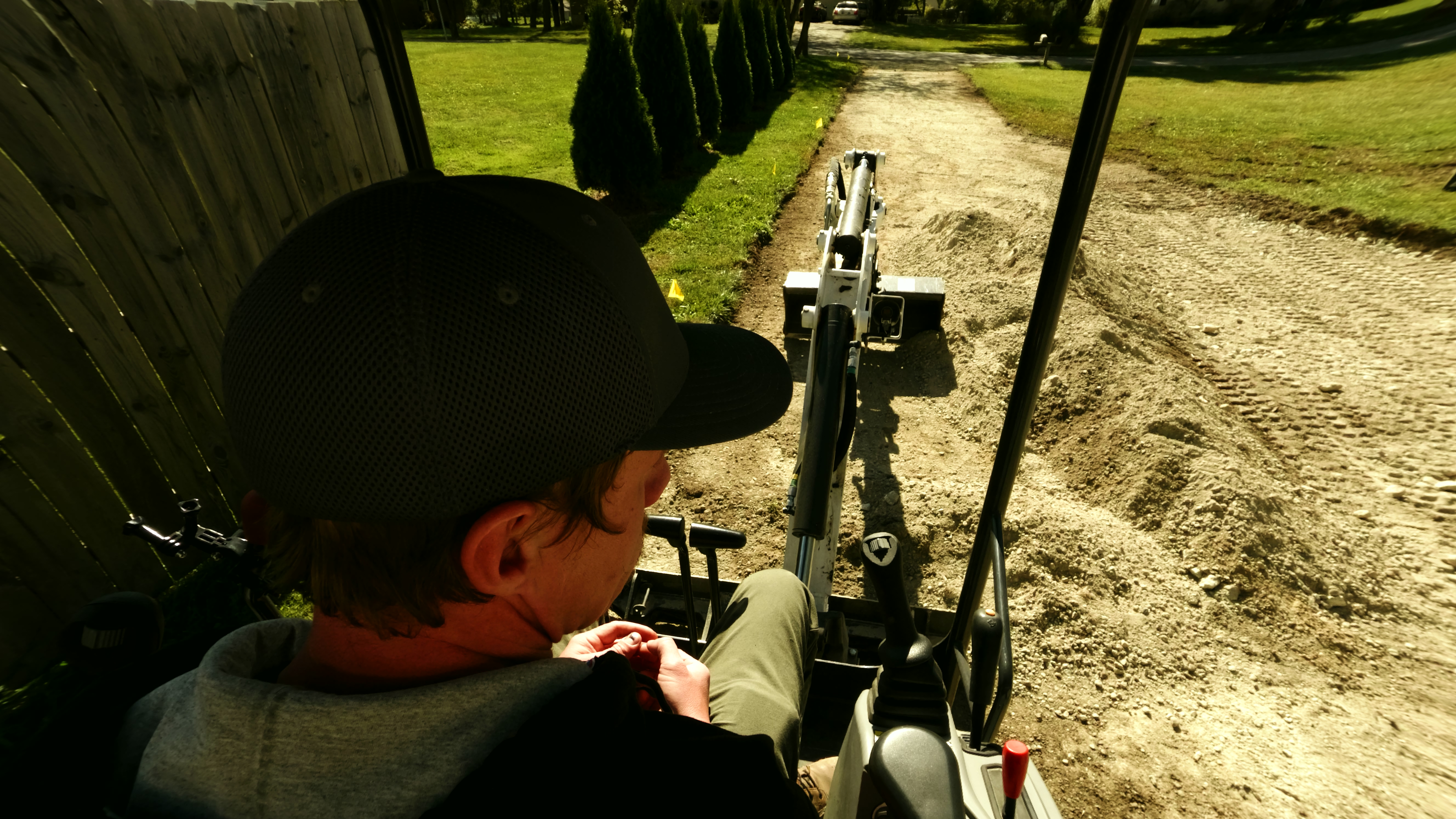 Josiah operating the Bobcat E20 mini excavator