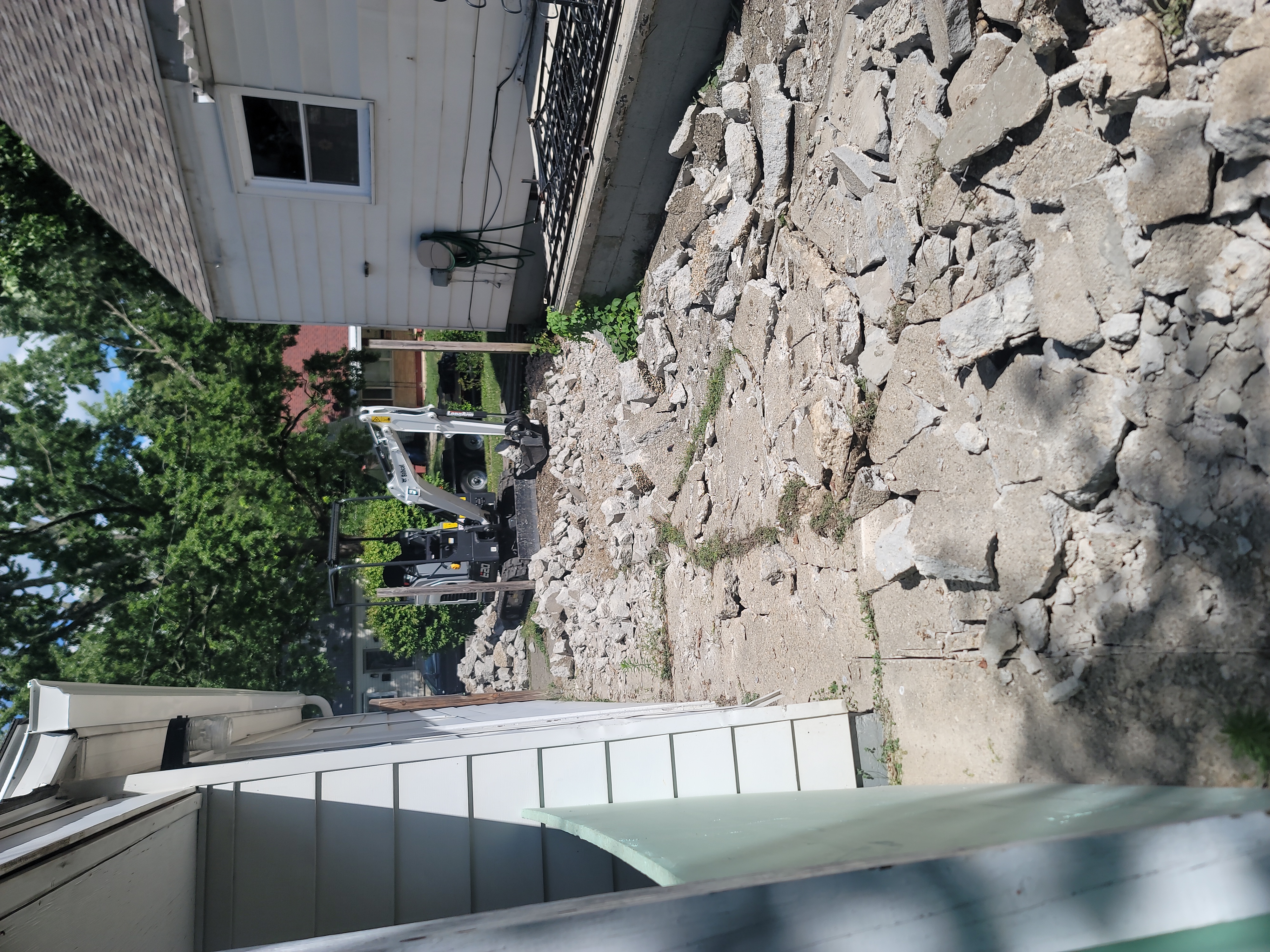 Concrete Demolition with Excavator